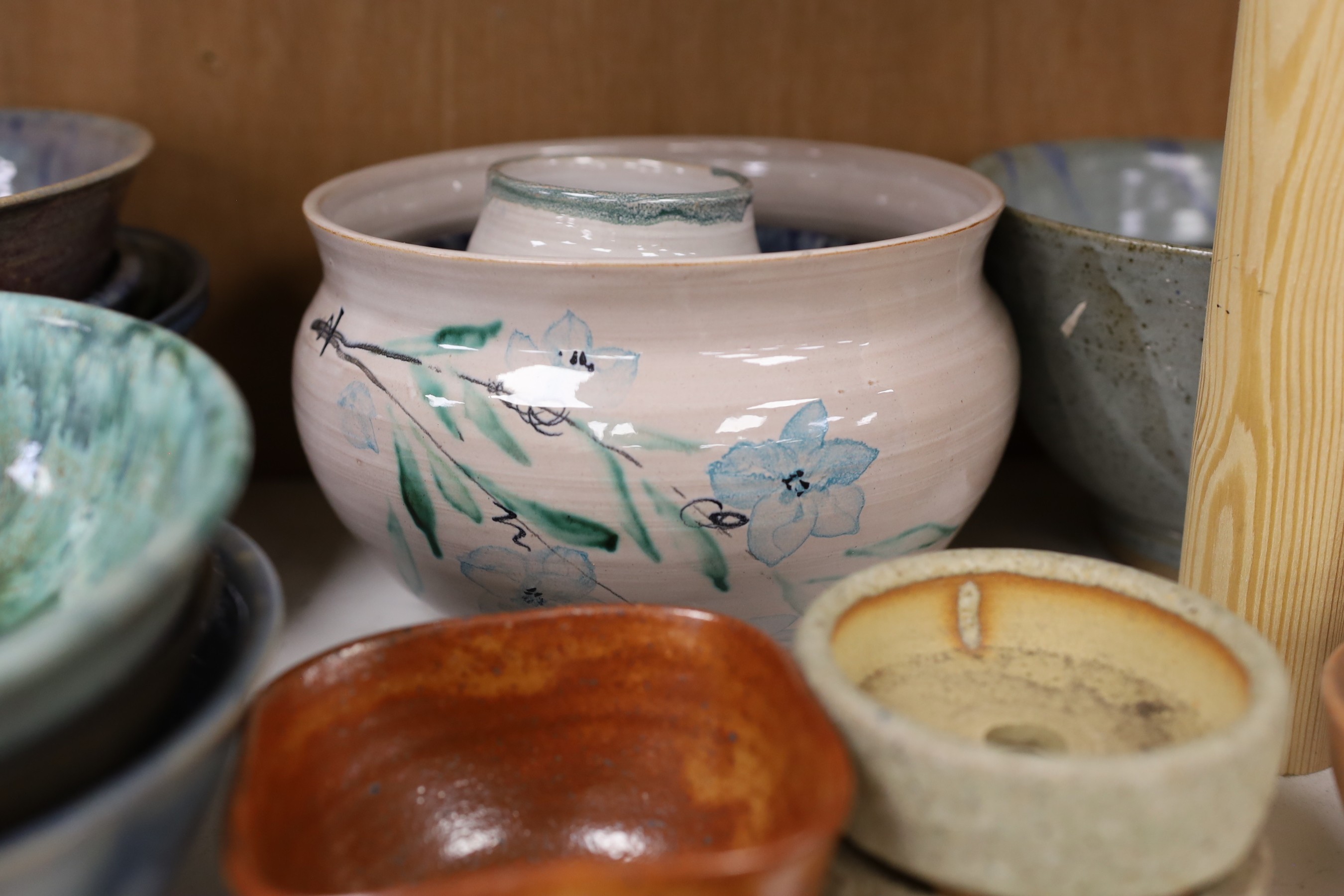 A large quantity of British studio pottery bowls and dishes, to include a vast amount by Susan Threadgold
